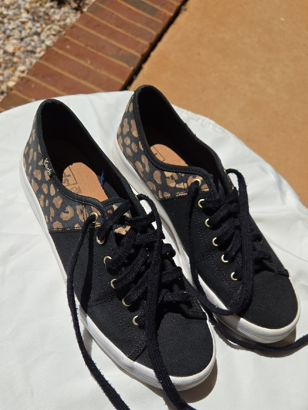 KEDS Women’s Black Canvas Sneakers with Leopard Accent